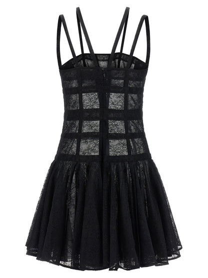 Dress by Giovanni Bedin for women in polyamide viscose black & transparent features an sultry silhouette defined by a and , falling to an sultry short mini for a sultry look.