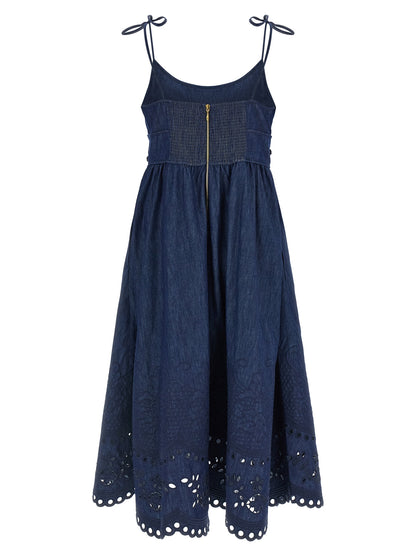 Dress by Zimmermann for women in denim cotton blue presents a sinuous silhouette, showcasing a sophisticated round square neckline and detailed with a sinuous midi for a refined finish.