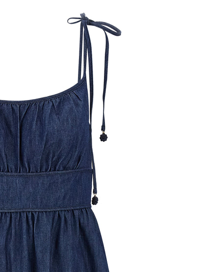 Dress by Zimmermann for women in denim cotton blue features an sultry silhouette defined by a round square neckline and , falling to an sultry midi for a sultry look.