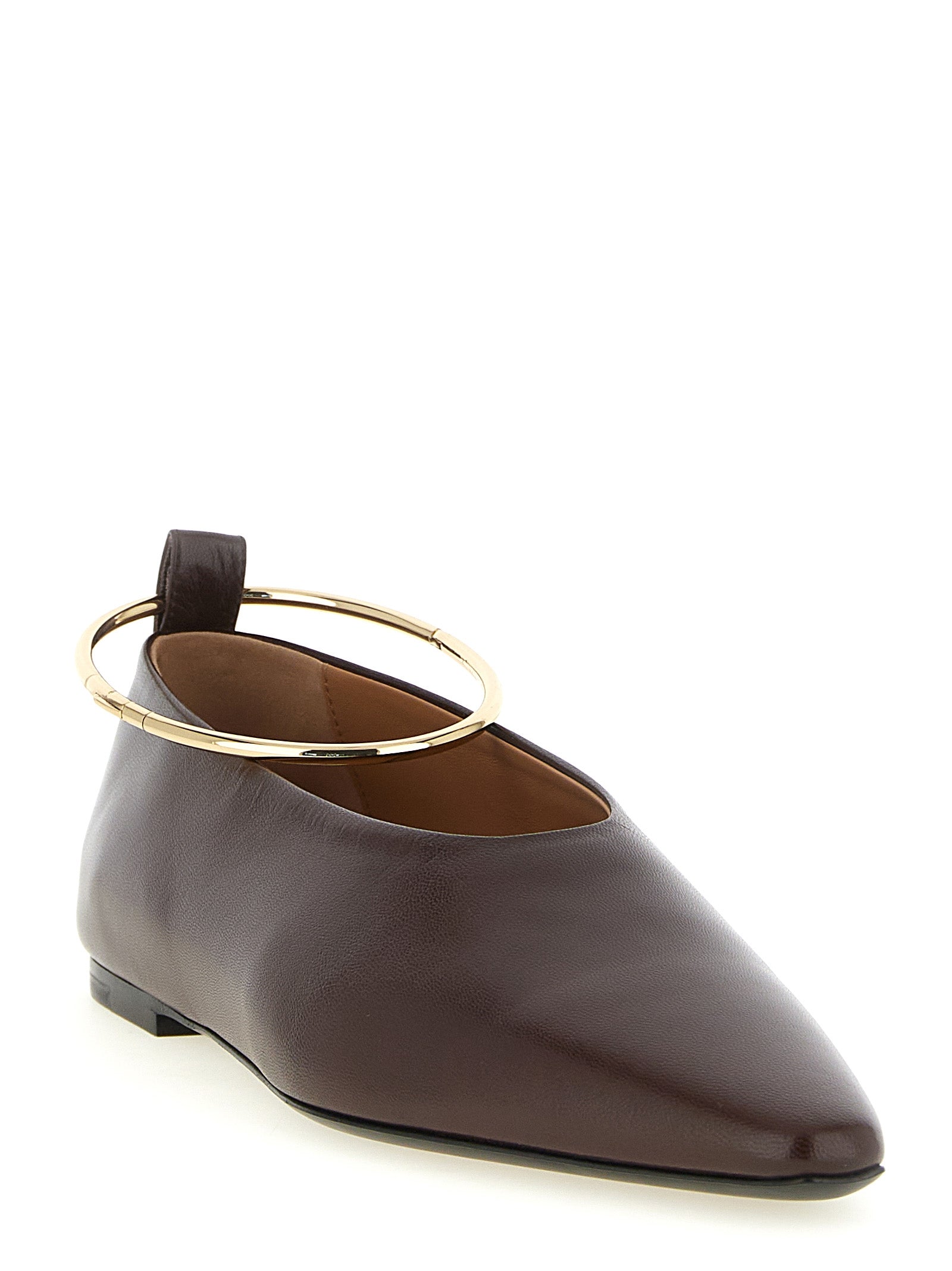 Ballet Flat Shoes by Jil Sander for women in goatskin leather brown showcases a dynamic silhouette, artfully capturing Women's Goatskin Leather Ballet Flat Shoes through its distinctive and elegant pointed toe style.