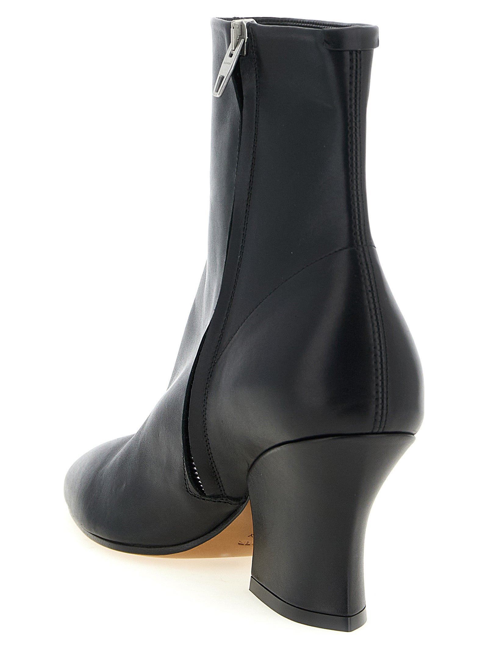 Ankle Boots by Jil Sander for women in calfskin leather black features an dynamic silhouette, showcasing the dynamic Women's Calfskin Leather Ankle Boots design with its distinctive and elegant almond toe style.