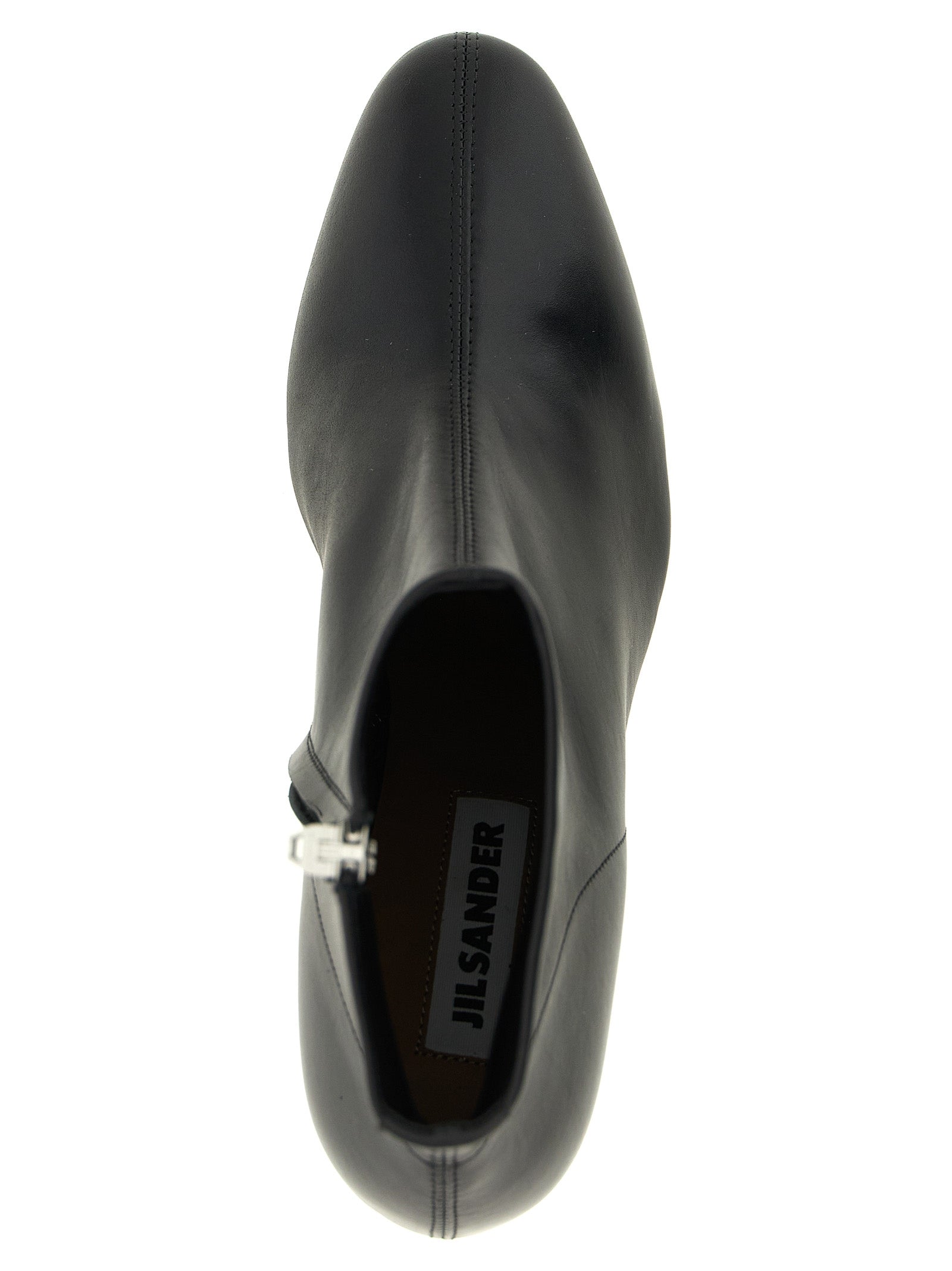 Ankle Boots by Jil Sander for women in calfskin leather black features an effortless chic silhouette from the Women's Calfskin Leather Ankle Boots collection, showcasing a effortless chic and refined almond toe style for an effortless chic look.