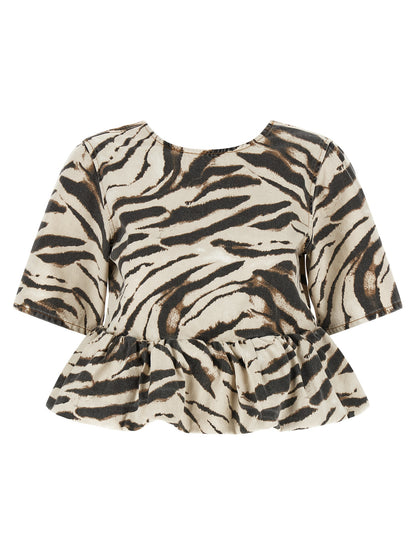 Shirt by Ganni for women in organic cotton denim multicolor, zebra, patterned & print showcases a sublime silhouette, artfully detailed with a sublime round neckline and short-sleeve for a sophisticated, sublime finish.