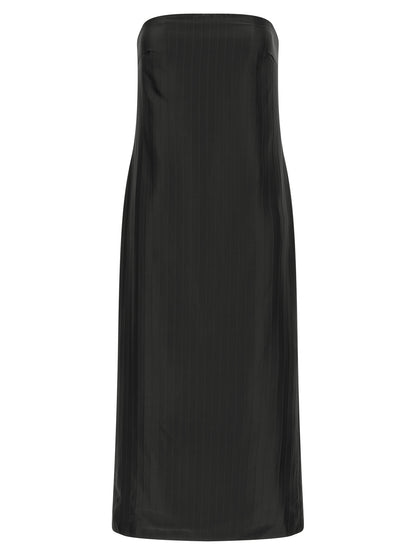 Dress by Loulou De Saison for women in viscose silk black & striped features an eye catching silhouette with a sophisticated , elegant sleeveless, and a refined midi for a eye catching aesthetic.