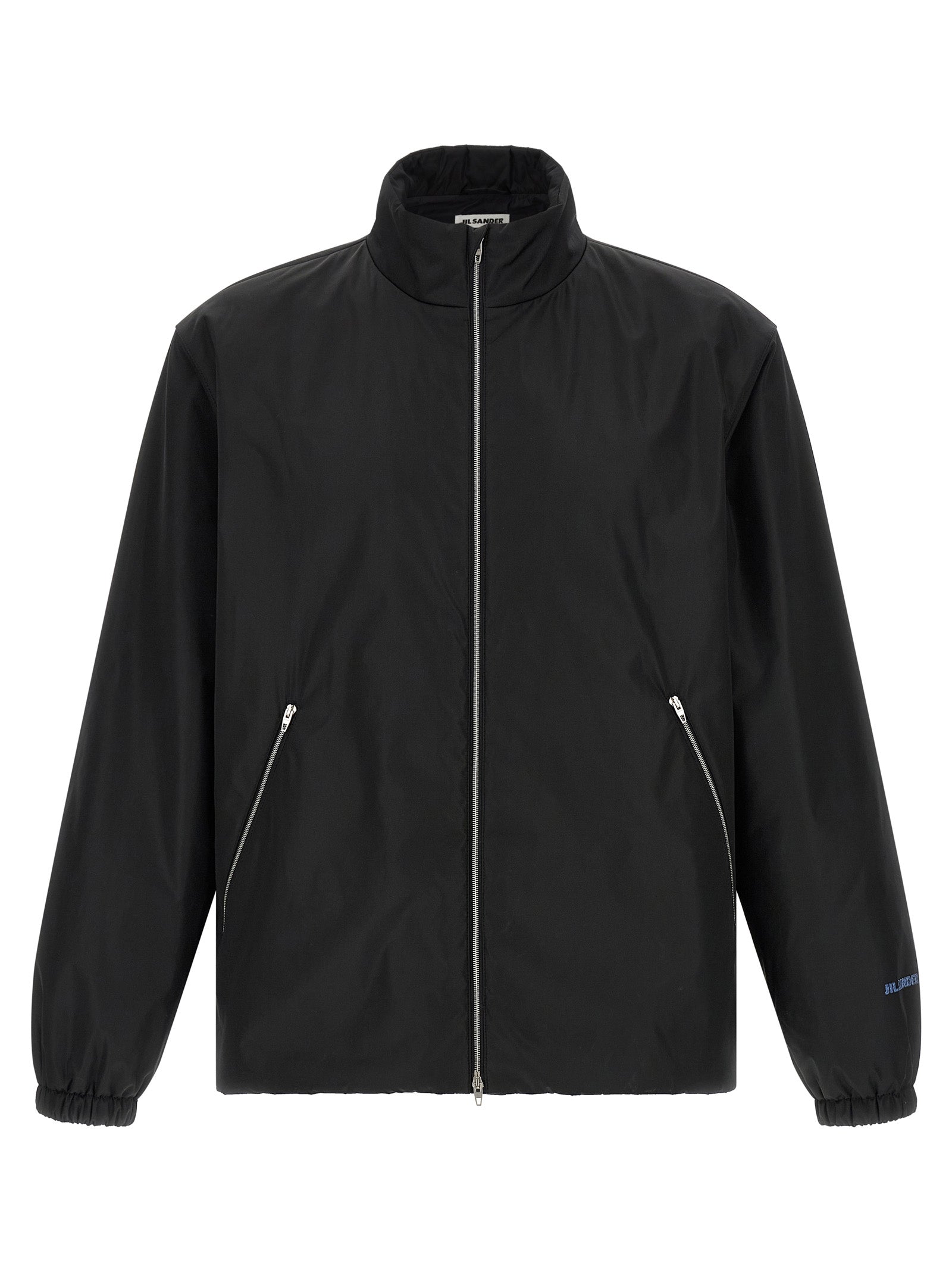 Overcoat by Jil Sander for men in polyester black showcases a architectural silhouette, artfully detailed with a distinctive high-neck neckline and functional pockets for a architectural finish.