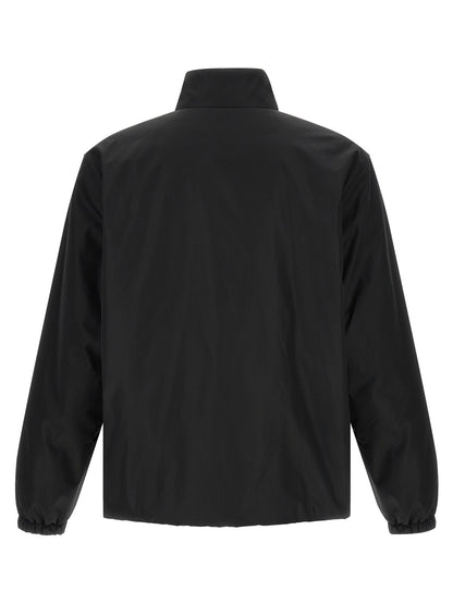 Overcoat by Jil Sander for men in polyester black features a cosy chic silhouette, artfully detailed with a sophisticated high-neck neckline and premium pockets for a cosy chic finish.