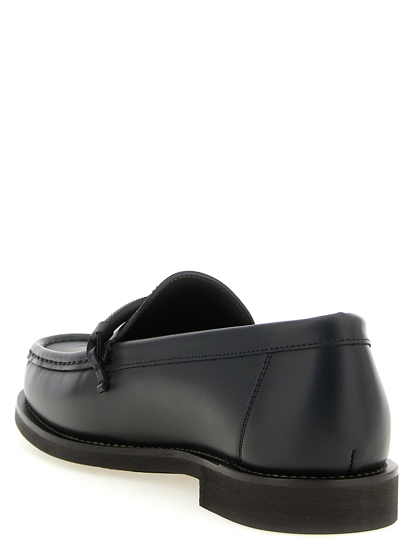 Flat Loafer Slip-On Shoes by Brunello Cucinelli for women in tu & calfskin leather black showcases a resplendent Monile Women's TU & Calfskin Leather Flat Loafer Slip-On Shoes aesthetic, defined by its resplendent and elegant flat.