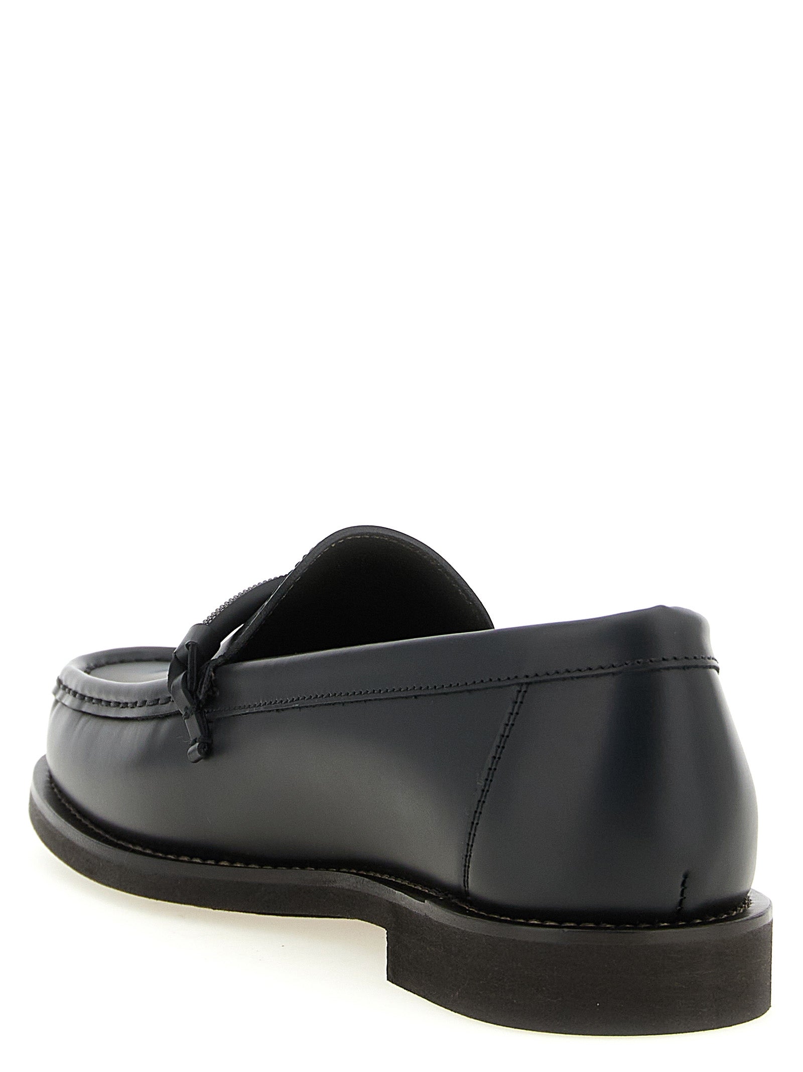Flat Loafer Slip-On Shoes by Brunello Cucinelli for women in tu & calfskin leather black showcases a resplendent Monile Women's TU & Calfskin Leather Flat Loafer Slip-On Shoes aesthetic, defined by its resplendent and elegant flat.