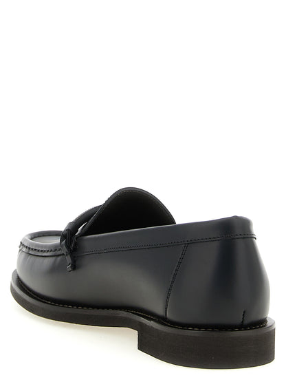 Flat Loafer Slip-On Shoes by Brunello Cucinelli for women in tu & calfskin leather black showcases a resplendent Monile Women's TU & Calfskin Leather Flat Loafer Slip-On Shoes aesthetic, defined by its resplendent and elegant flat.