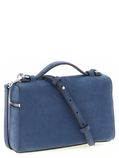 Handbag by Tory Burch for women in nubuck & suede lamb leather blue features a contemporary silhouette, showcasing a secure , ample , and contemporary shoulder-strap, handle & adjustable-strap for a sophisticated look.