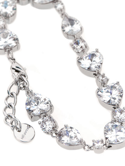 Bracelet by Self-Portrait for women in virgin cashmere wool & leather silver showcases a cosmopolitan silhouette, artfully capturing the essence of the cosmopolitan Heart Women's Silver Brass & Crystal Bracelet with a cosmopolitan .
