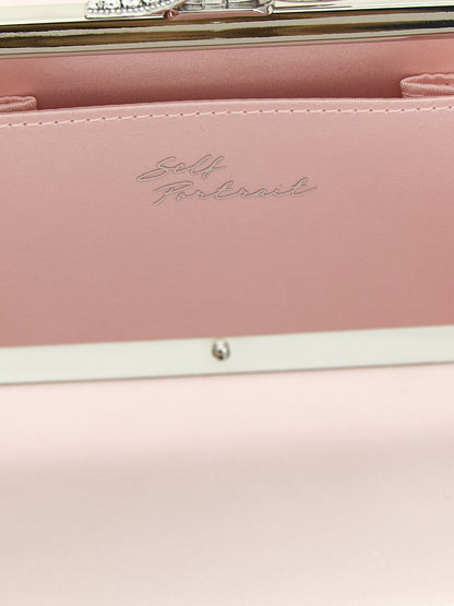Shoulder Clutch Handbag by Self-Portrait for women in polyester polyurethane satin multicolor & pink showcases a sculptural silhouette, featuring a secure magnetic, ample , and versatile shoulder-strap for a sculptural finish.