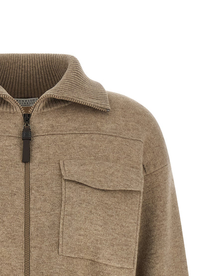 Cardigan by Brunello Cucinelli for women in polyamide & cashmere beige showcases a luxurious silhouette, meticulously detailed with a sophisticated high-neck neckline and for a refined finish.