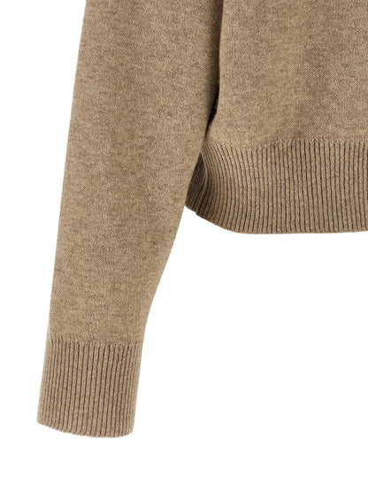 Cardigan by Brunello Cucinelli for women in polyamide & cashmere beige features a dramatic silhouette, showcasing a sophisticated and dramatic detail for a timeless, premium look.