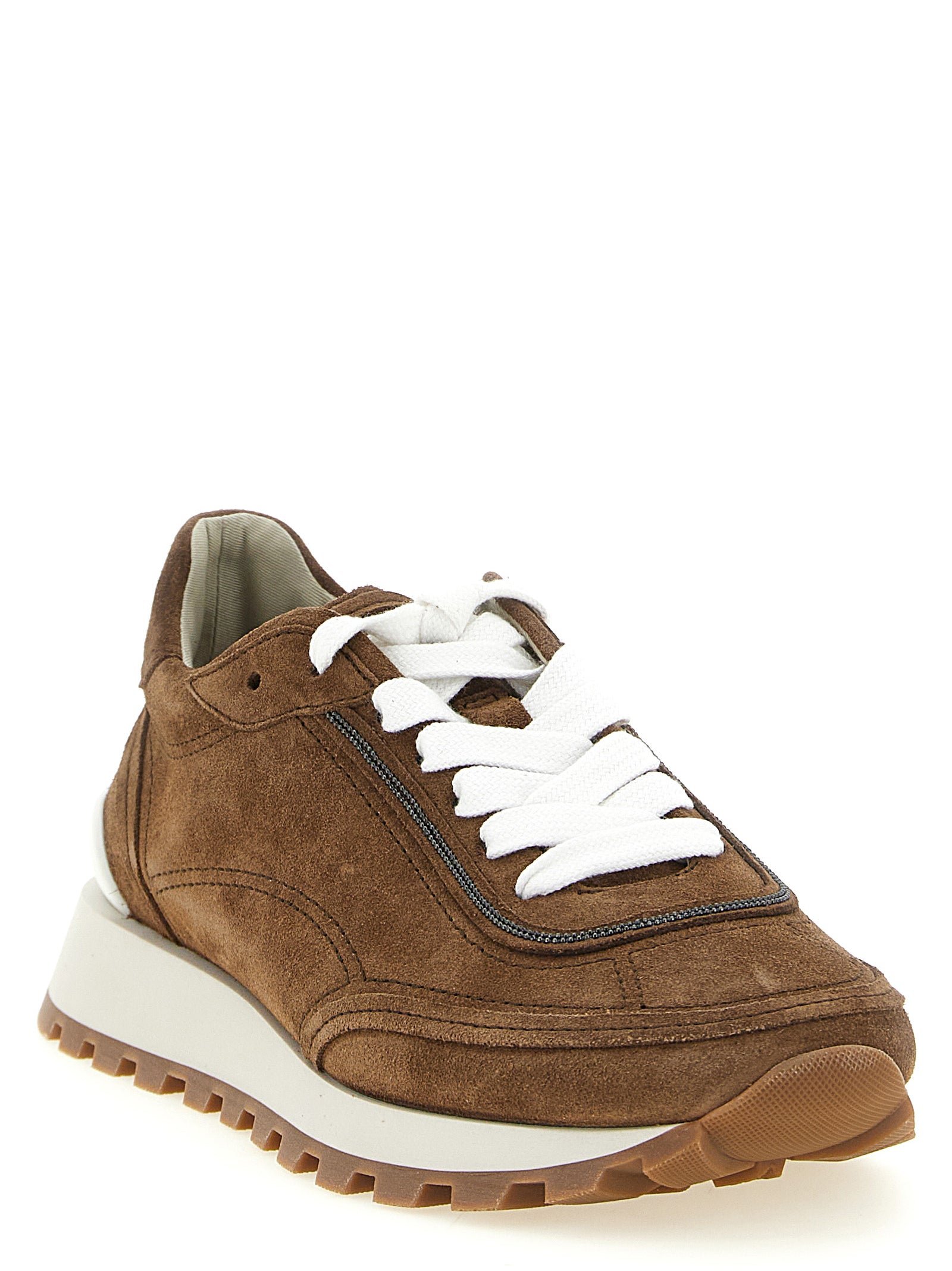 Sneakers by Brunello Cucinelli for women in suede calfskin leather brown presents a impeccable silhouette as Monile Women's Low Top Suede Calfskin Leather Sneakers, expertly defined by a impeccable low-top style for a impeccable, high-fashion look.