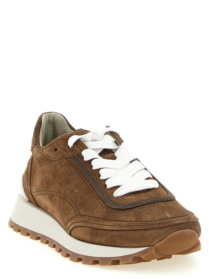 Sneakers by Brunello Cucinelli for women in suede calfskin leather brown presents a impeccable silhouette as Monile Women's Low Top Suede Calfskin Leather Sneakers, expertly defined by a impeccable low-top style for a impeccable, high-fashion look.