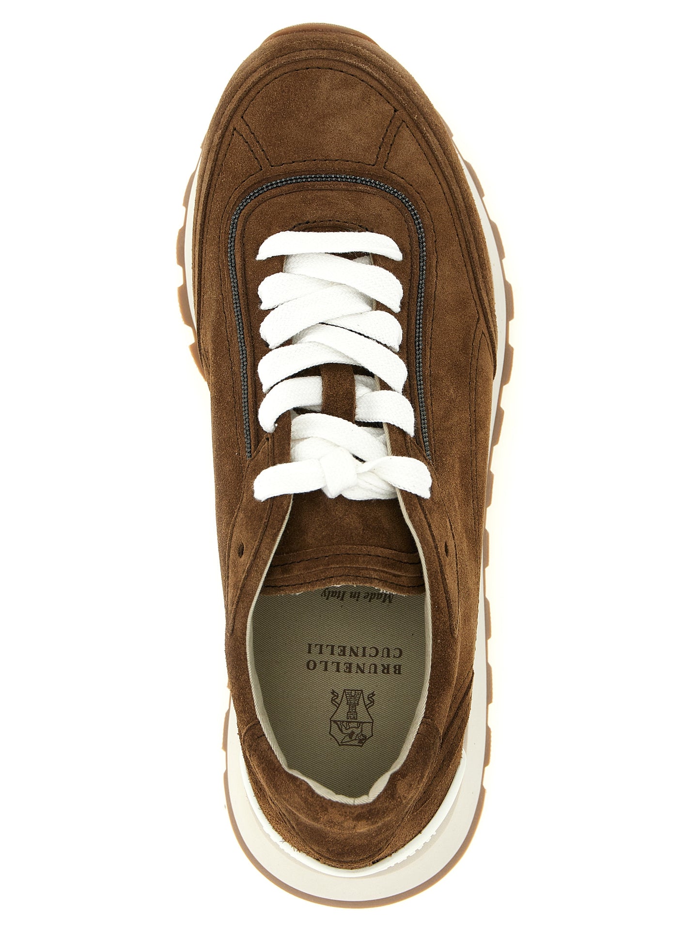 Sneakers by Brunello Cucinelli for women in suede calfskin leather brown presents a sumptuous silhouette, artfully capturing the essence of the Monile Women's Low Top Suede Calfskin Leather Sneakers with its sumptuous low-top style design.