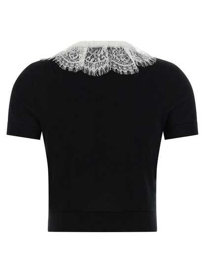 Blouse by Self-Portrait for women in wool bicolour, black & white showcases a sharp silhouette, elegantly detailed with a sharp and sharp .