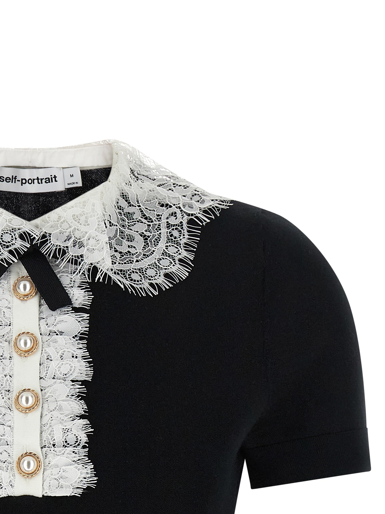 Blouse by Self-Portrait for women in wool bicolour, black & white presents a discerning silhouette, showcasing a sophisticated and for a truly discerning finish.