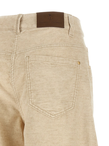 Trousers by Brunello Cucinelli for women in linen cotton corduroy beige & signature presents a perennial silhouette, meticulously tailored with a wide cut, long finish, and an elegant high rise.