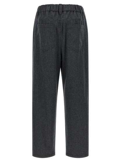 Pants by Brunello Cucinelli for women in wool gray features an understated silhouette, showcasing a sophisticated tapered-leg and long with a refined mid rise for an understated, polished aesthetic.