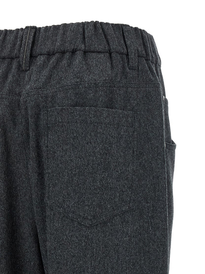 Pants by Brunello Cucinelli for women in wool gray features a utilitarian tapered-leg with a utilitarian long and mid rise to create a sophisticated, premium look.
