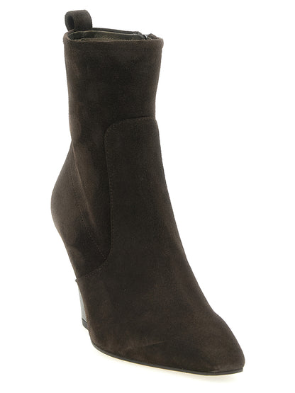 Ankle Boots by Brunello Cucinelli for women in bos taurus suede calfskin leather brown features an avant-garde Monile Women's Bos Taurus Suede Calfskin Leather Ankle Boots silhouette, defined by a sophisticated and a avant-garde square toe style.