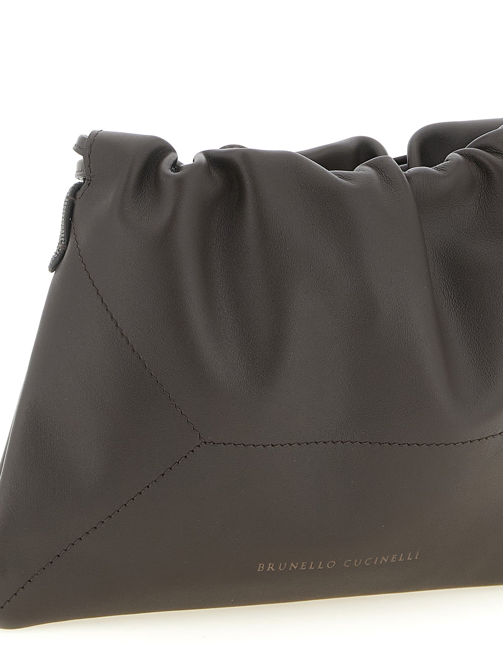 Drawstring Pouch Clutch Handbag by Brunello Cucinelli for women in calfskin leather brown showcases a sculptural silhouette, featuring a secure drawstring, ample , and versatile shoulder-strap for a sculptural aesthetic.