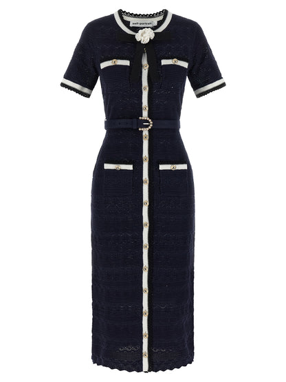 Dress by Self-Portrait for women in stretch poly cotton navy & floral features an magnificent silhouette, artfully detailed with a magnificent crew neckline and short-sleeve that flows into an magnificent midi short.