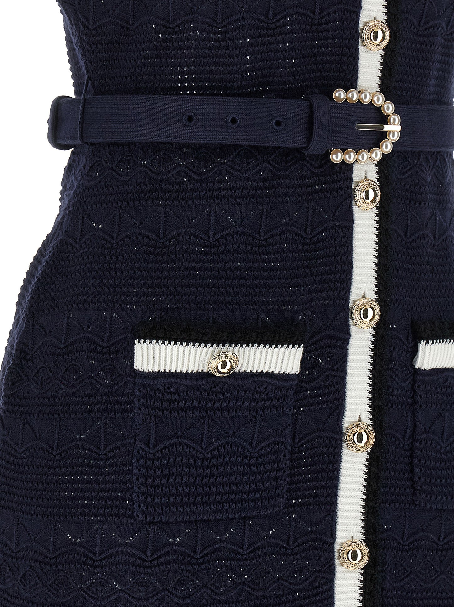 Dress by Self-Portrait for women in stretch poly cotton navy & floral features a dramatic silhouette, showcasing an elegant and that flows into a dramatic midi short.