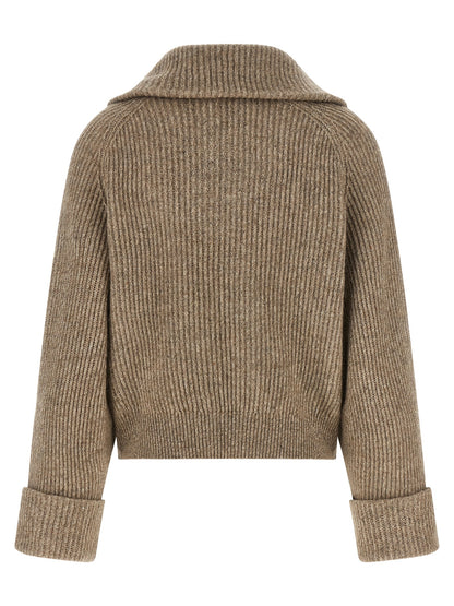 Cardigan by Brunello Cucinelli for women in polyamide cashmere & leather beige presents a textural silhouette, artfully finished with a textural wrap neckline and for a sophisticated, textural look.