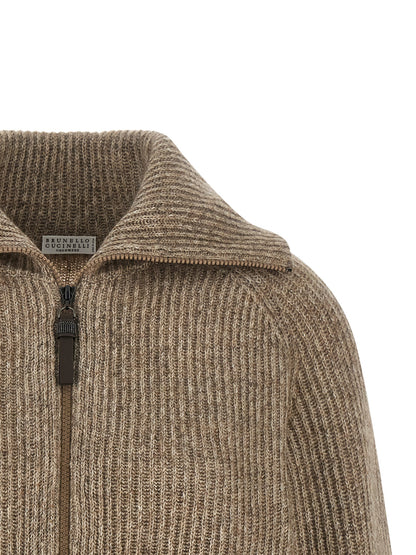 Cardigan by Brunello Cucinelli for women in polyamide cashmere & leather beige showcases a captivating silhouette, artfully detailed with a captivating and wrap neckline for a truly sophisticated captivating look.