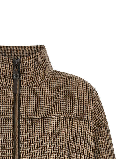 Jacket by Brunello Cucinelli for women in silk virgin wool polyamide leather brown, patterned & signature features an utilitarian silhouette with a refined high-neck neckline, showcasing sophisticated pockets for an utilitarian aesthetic.