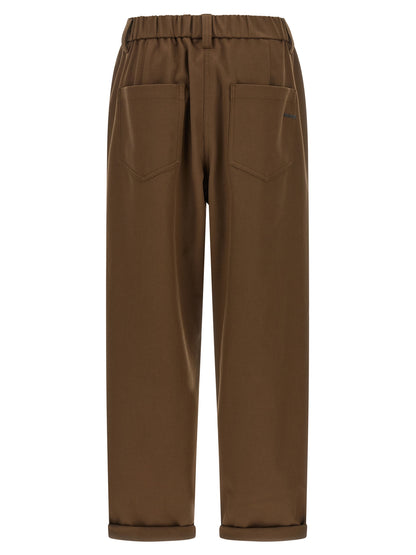 Trousers by Brunello Cucinelli for women in stretch cotton brown features a artisanal silhouette, showcasing a sophisticated tapered-leg, relaxed-fit & wide with a long and mid rise for a artisanal finish.