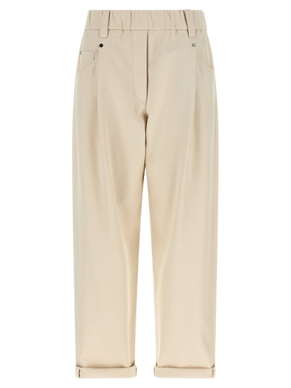Trousers by Brunello Cucinelli for women in stretch cotton beige features a tailored silhouette with a tailored tapered-leg & wide, defined by its long and a sophisticated mid rise.