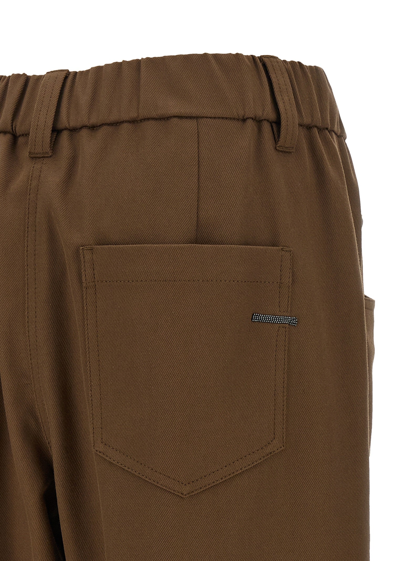 Trousers by Brunello Cucinelli for women in stretch cotton brown features a sculptural silhouette, showcasing a sculptural tapered-leg, relaxed-fit & wide and long with a sophisticated mid rise for a sculptural finish.