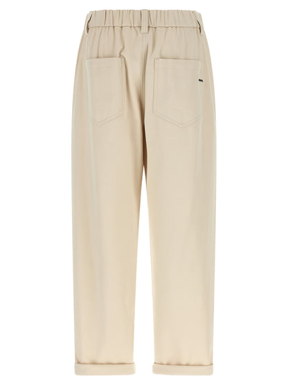 Trousers by Brunello Cucinelli for women in stretch cotton beige features an on trend silhouette, showcasing a sophisticated tapered-leg & wide with a long and mid rise for an on trend finish.