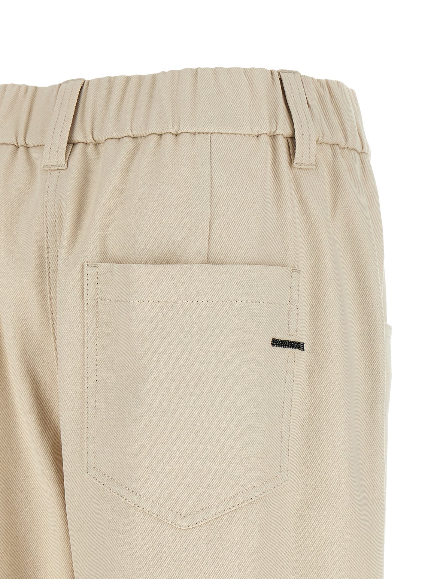 Trousers by Brunello Cucinelli for women in stretch cotton beige features a tailored silhouette with a tailored tapered-leg & wide, defined by its long and a sophisticated mid rise.