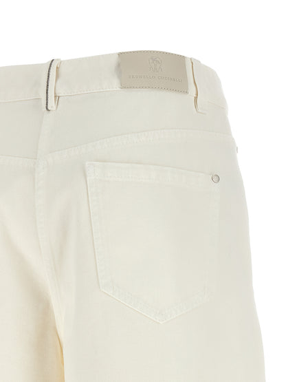 Jeans by Brunello Cucinelli for women in cotton denim white presents a refined pantology silhouette, artfully defined by a refined pantology relaxed-fit & wide, long, and a sophisticated high rise.