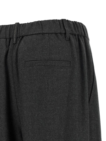 Trousers by Brunello Cucinelli for women in virgin wool gray & signature features a artisanal silhouette, showcasing a sophisticated tapered-leg & wide with a long and for a artisanal finish.
