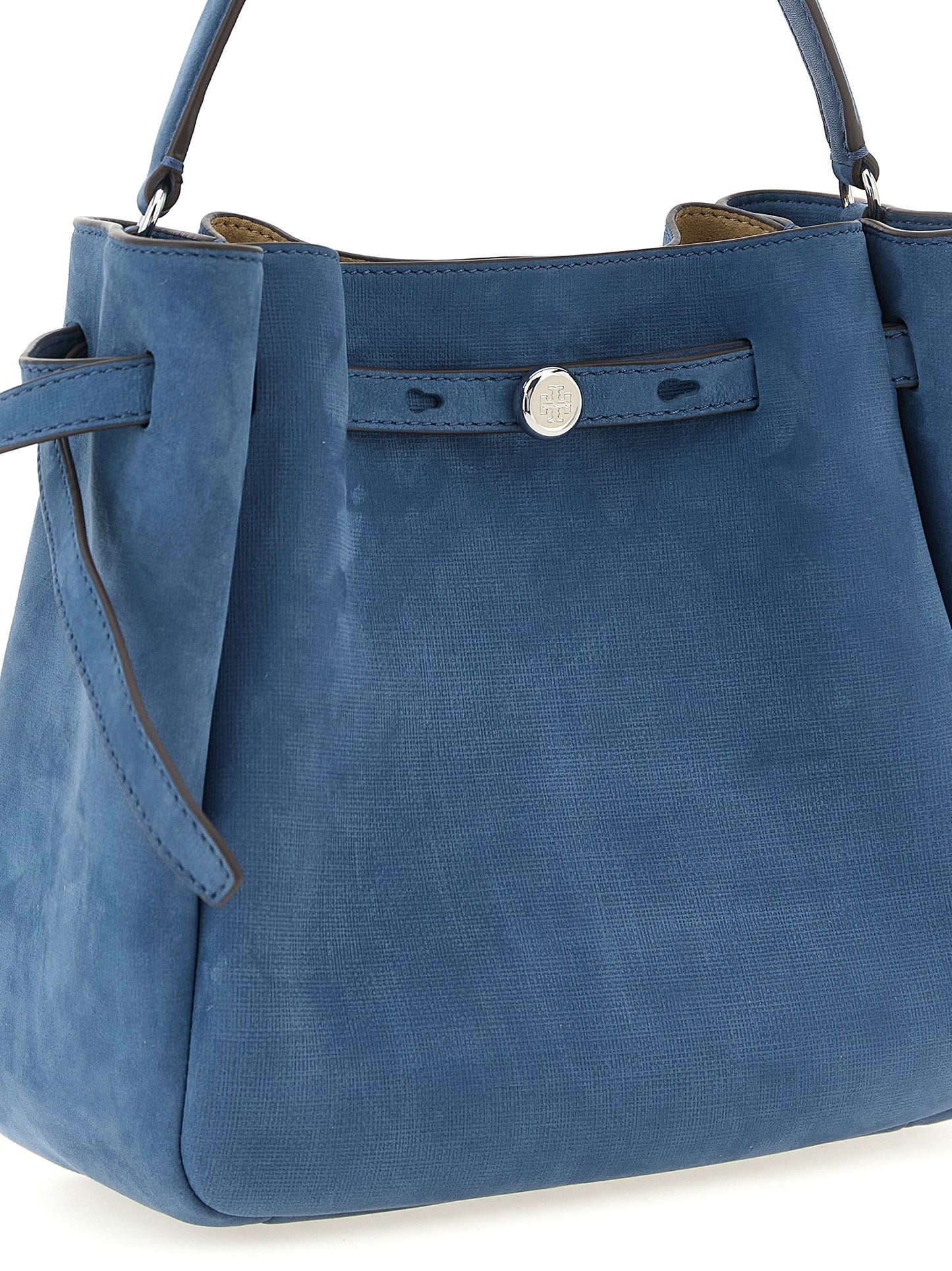 This Crossbody Bucket Handbag by Tory Burch for women in nubuck & suede lamb leather and blue presents a sculptural silhouette featuring a secure snap, magnetic & button, ample , and versatile crossbody-strap, shoulder-strap, handle, adjustable-strap & belt-strap for a sculptural finish.