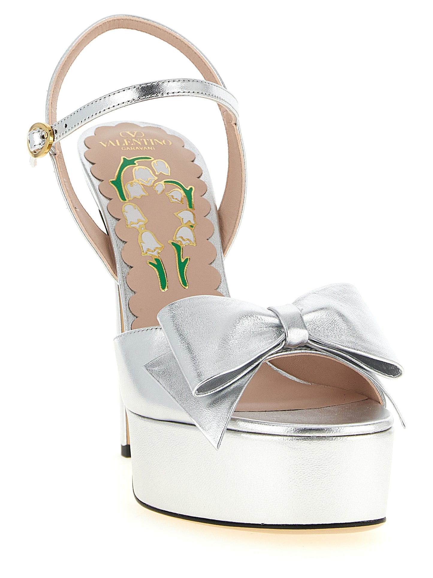 Platform Stiletto Ankle Strap Sandals by Valentino Garavani for women in leather & metal silver, floral & signature features an architectural design from the V Logo Women's Leather & Metal Platform Stiletto Ankle Strap Sandals collection, defined by a architectural stiletto platform and for a architectural finish.