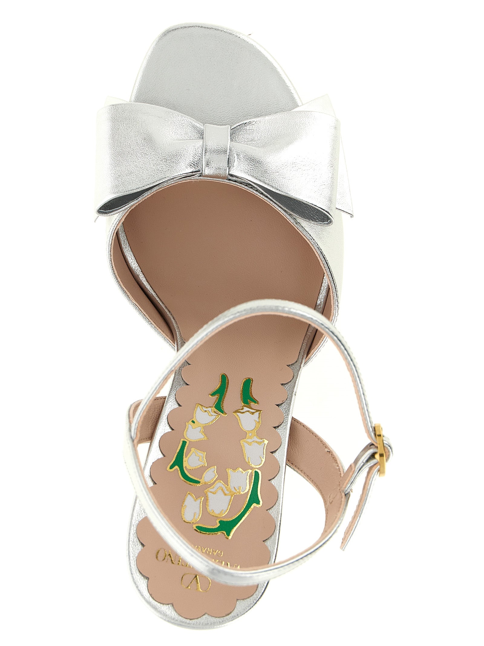 Platform Stiletto Ankle Strap Sandals by Valentino Garavani for women in leather & metal silver, floral & signature features an exquisite silhouette, showcasing the exquisite V Logo Women's Leather & Metal Platform Stiletto Ankle Strap Sandals with a stiletto platform and .