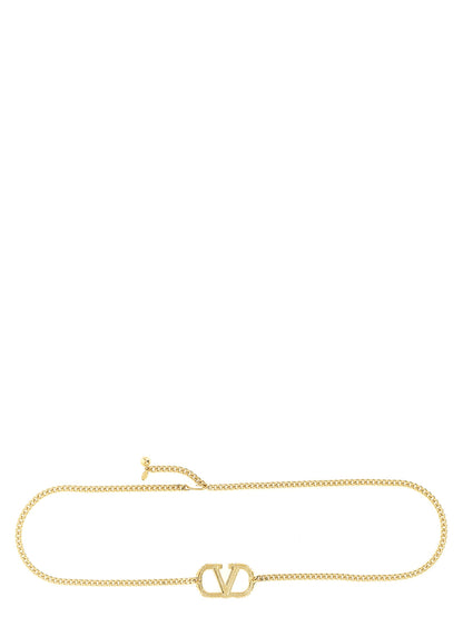 Belt by Valentino Garavani for women in brass gold & signature features a versatile silhouette, artfully showcasing the versatile design of the V Logo Brass Belt for a sophisticated, premium finish.