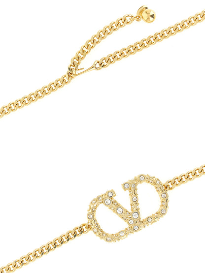 Belt by Valentino Garavani for women in brass gold & signature features an artisanal finish, elegantly showcasing the signature style and artisanal craftsmanship of the V Logo Brass Belt design.