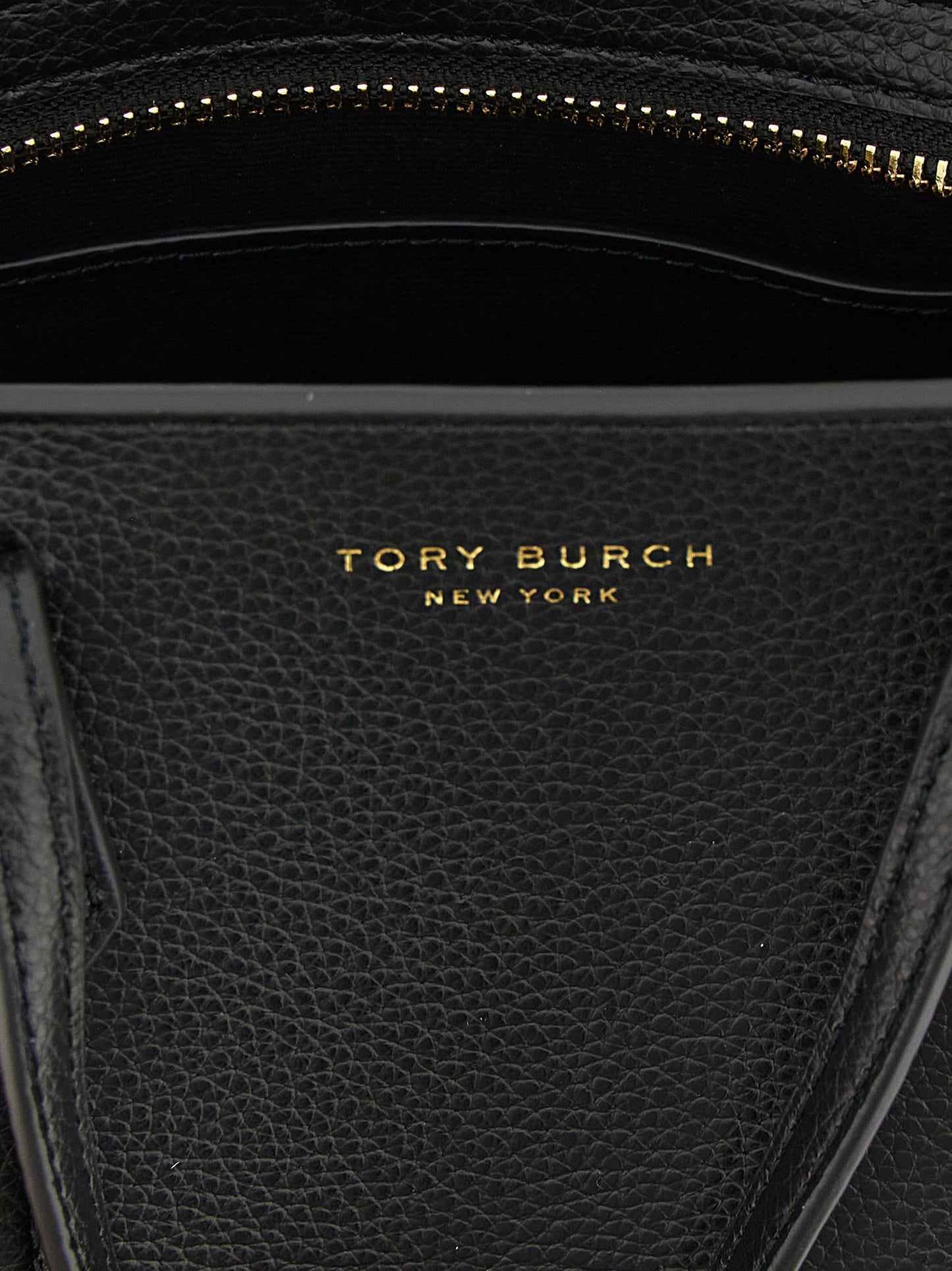 Mini Crossbody Tote Handbag by Tory Burch for women in leather & metal black & gold features a contemporary silhouette, showcasing a secure zipper, ample , and contemporary crossbody-strap, shoulder-strap, handle & adjustable-strap for a sophisticated look.