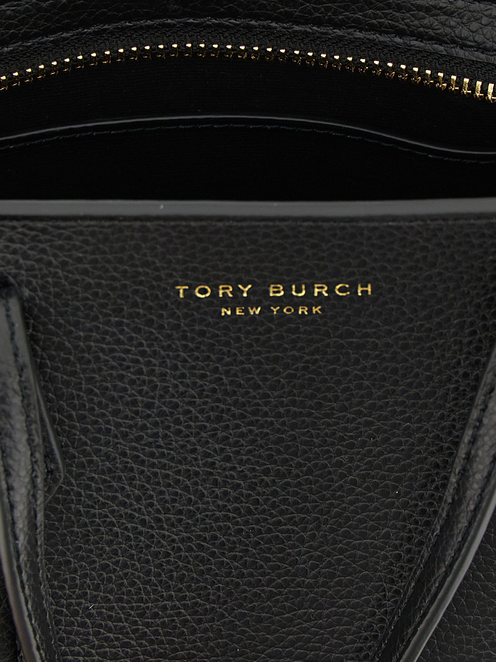 Mini Crossbody Tote Handbag by Tory Burch for women in leather & metal black & gold features a contemporary silhouette, showcasing a secure zipper, ample , and contemporary crossbody-strap, shoulder-strap, handle & adjustable-strap for a sophisticated look.