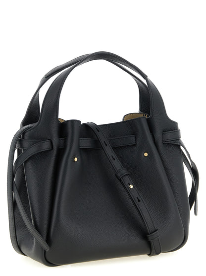 Small Handbag by Tory Burch for women in bos taurus suede calf leather black & signature features a contemporary silhouette, showcasing a secure magnetic, ample , and contemporary shoulder-strap, handle, adjustable-strap & belt-strap for a sophisticated look.