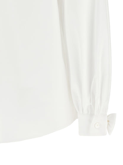 Blouse by Valentino Garavani for women in cotton white & signature showcases a sharp silhouette, elegantly detailed with a sharp and sharp .