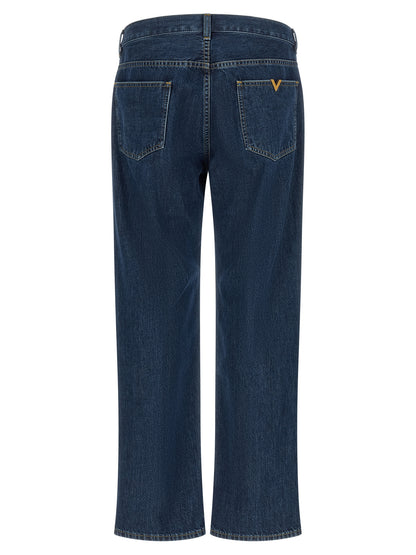 Jeans by Valentino Garavani for men in denim cotton blue & gold features an refined tailoring silhouette, showcasing a premium straight-leg with a and long cut for a refined tailoring look.